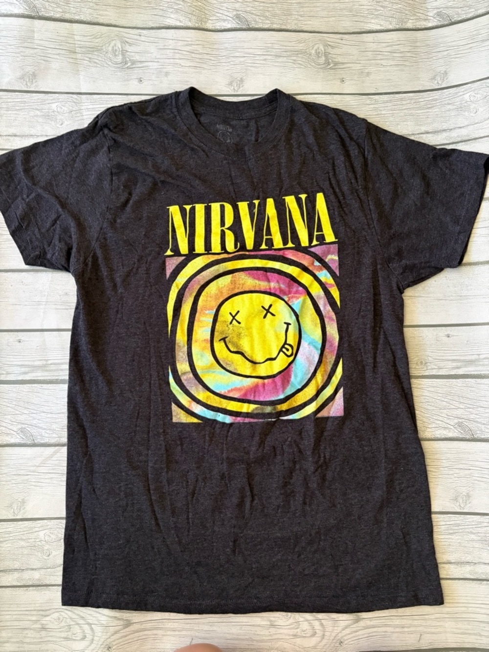 NIRVANA Black Tee with Yellow Tie-Dye Smiley Graphic
